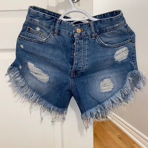 Ripped denim shorts